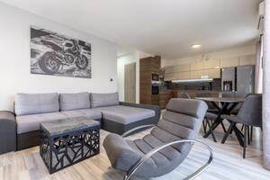 Nabídka přes realitního makléře Brno: Prodej moderního bytu 3+kk se dvěma balkony a garážovým stáním – Rajhrad, Brno-venkov 1